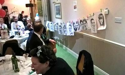 Caricaturist display at party