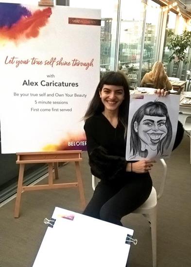 Caricaturist in a office party